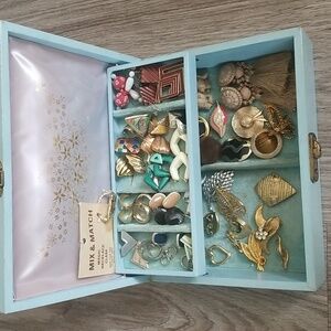 Vintage Jewelry Box with Assorted Earrings, Brooches, and Scarf Clips